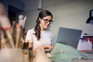 women in glasses on her computer 
